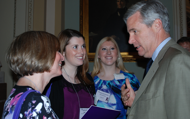 Sheldon Whitehouse speaking with Rhode Island families who came to DC to share their experiences with pancreatic cancer and request increased research on June 26, 2012 in the United States Capital.  